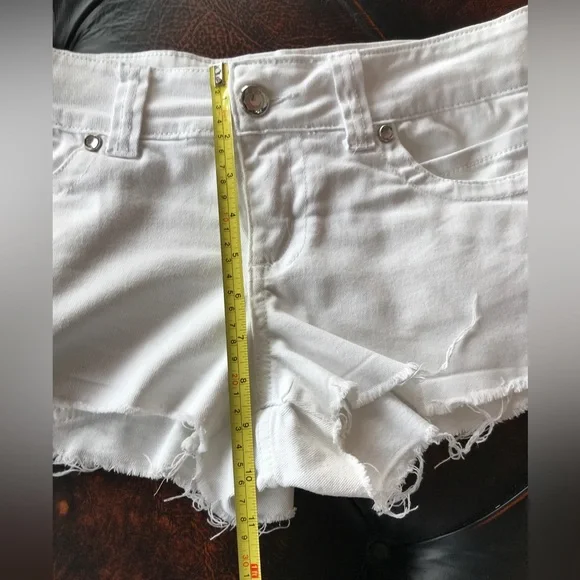 Low rise Shorty shorts - white jean 34” hip/lower waist as it sits lower.   9/10 - Picture 7 of 9